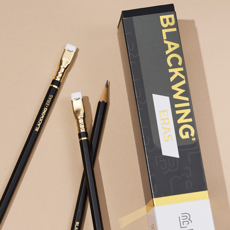 Blackwing pencils featuring black, gold, and white colorway
