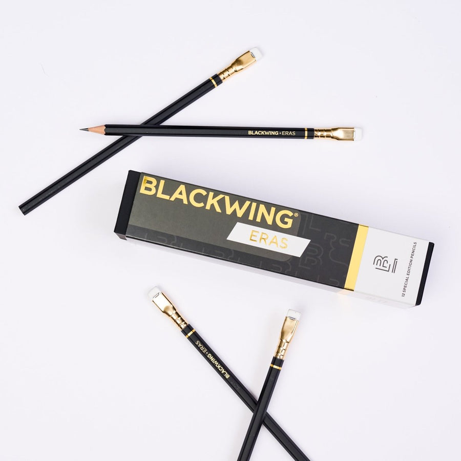 Blackwing Eras pencils laying on a white background with packaging